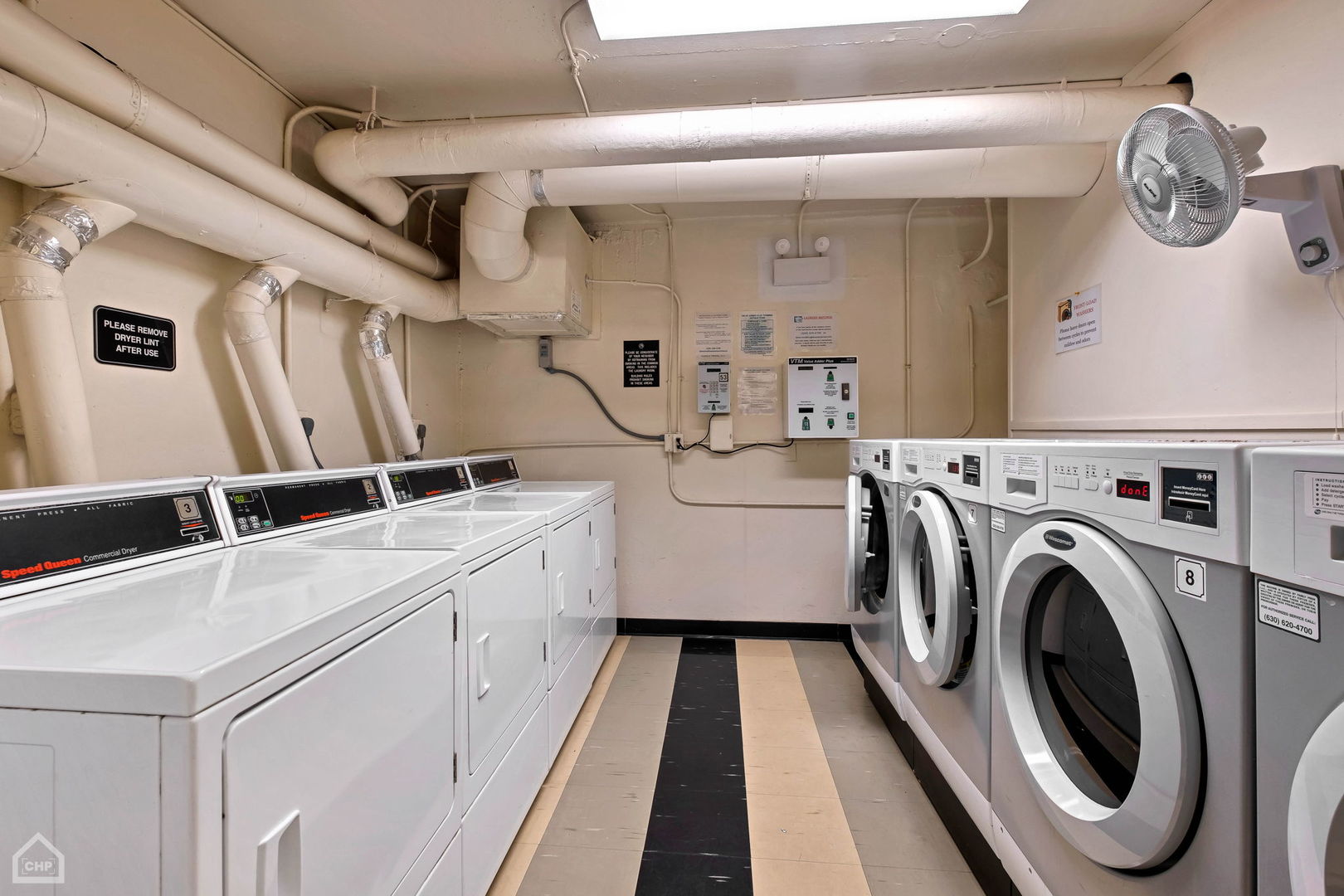 5733 North Sheridan Road, Unit 25C Chicago, IL 60660 - Photo 23 of 39 a utility room with dryer and washer