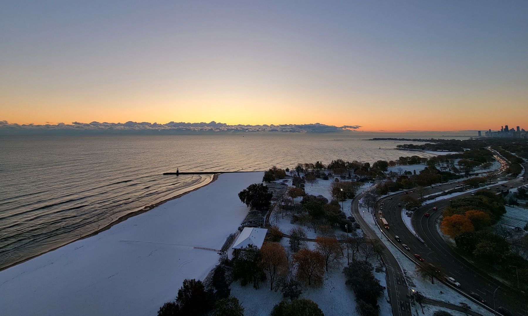 5733 North Sheridan Road, Unit 25C Chicago, IL 60660 - Photo 31 of 39 a view of a terrace with outdoor seating and lake view
