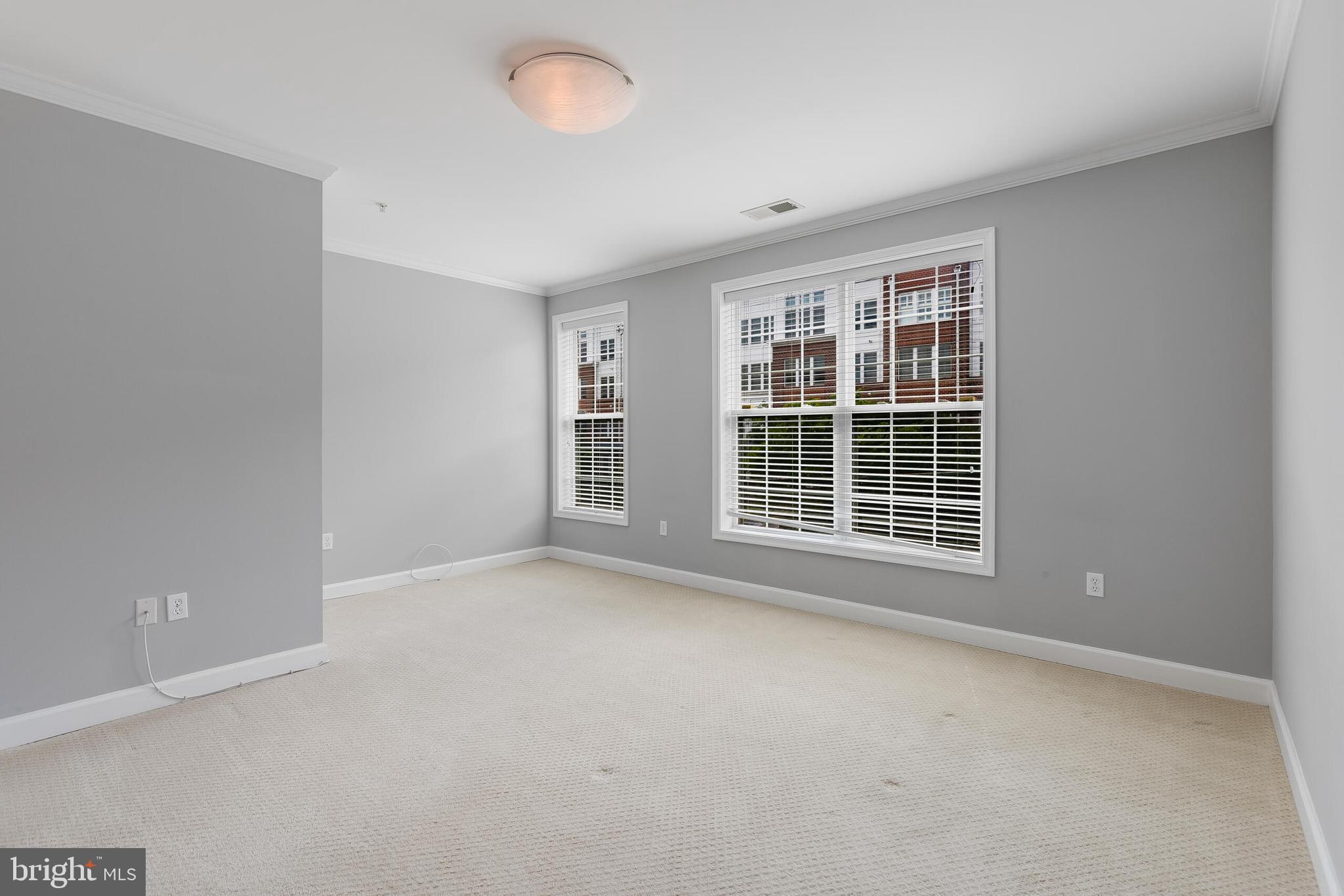 1423 North Rhodes Street, Unit 201 Arlington, VA 22209 - Photo 14 of 30 Owner's Bedroom