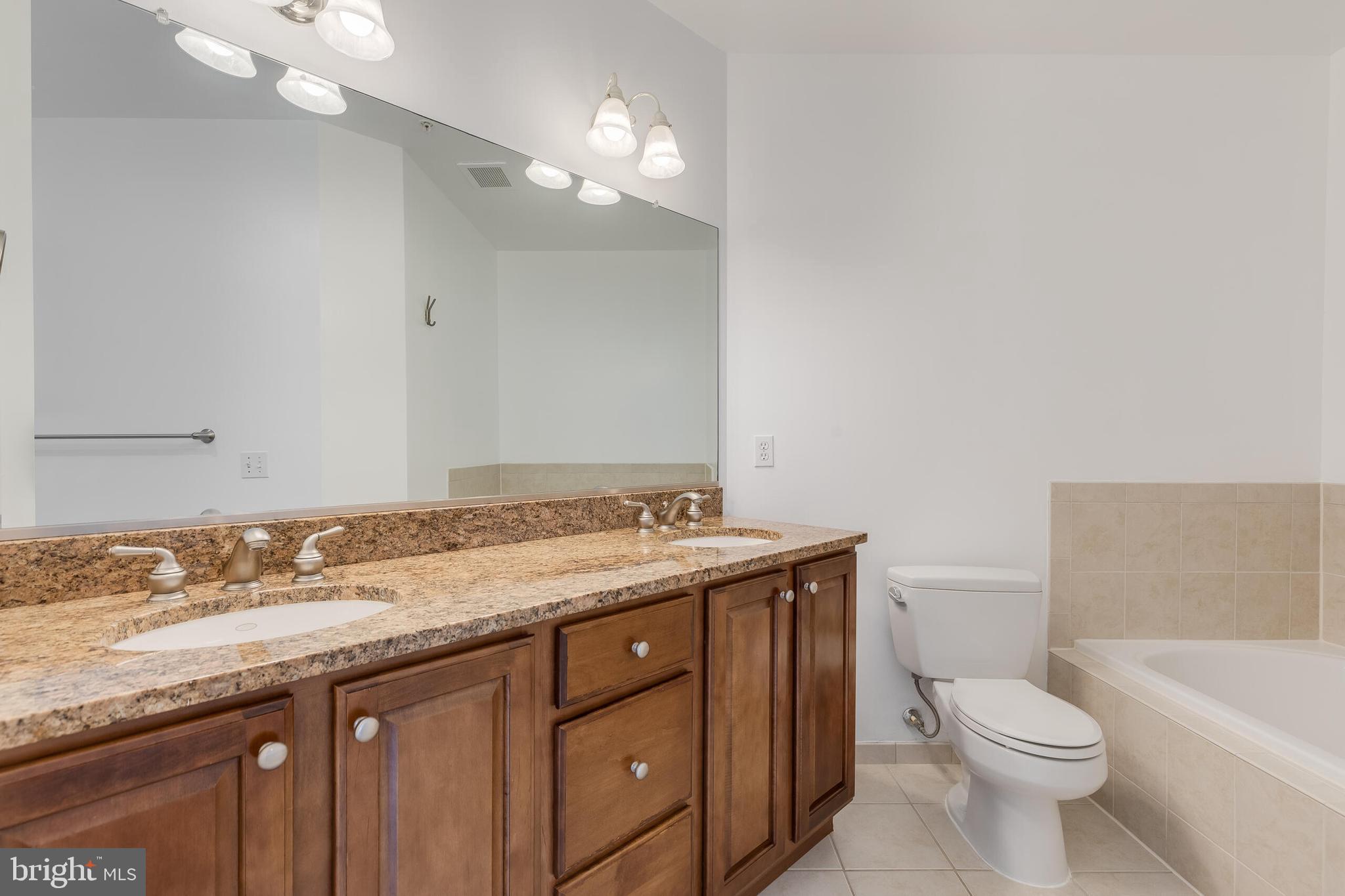 1423 North Rhodes Street, Unit 201 Arlington, VA 22209 - Photo 18 of 30 Bathroom with Double Sink