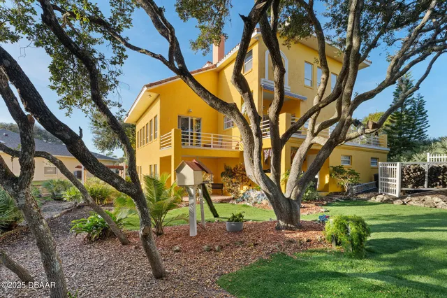 a kitchen with stainless steel appliances granite countertop a stove and a refrigerator