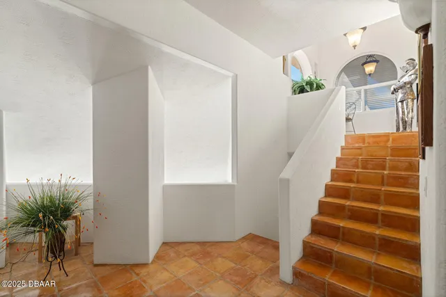 an aerial view of house with yard