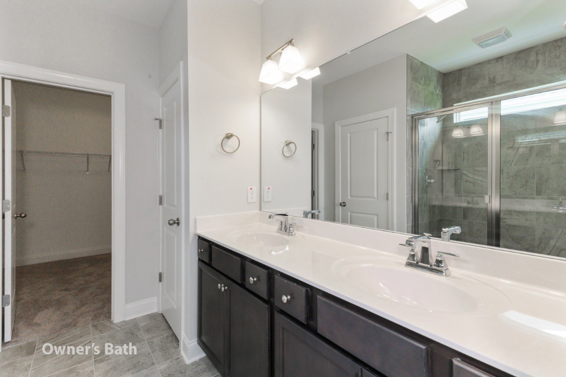 404 Butler Road Mount Juliet, TN 37122 - Photo 13 of 23 a bathroom with a double vanity sink mirror and double