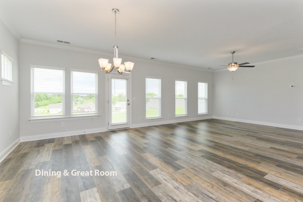 404 Butler Road Mount Juliet, TN 37122 - Photo 9 of 23 a view of an empty room with wooden floor and a window