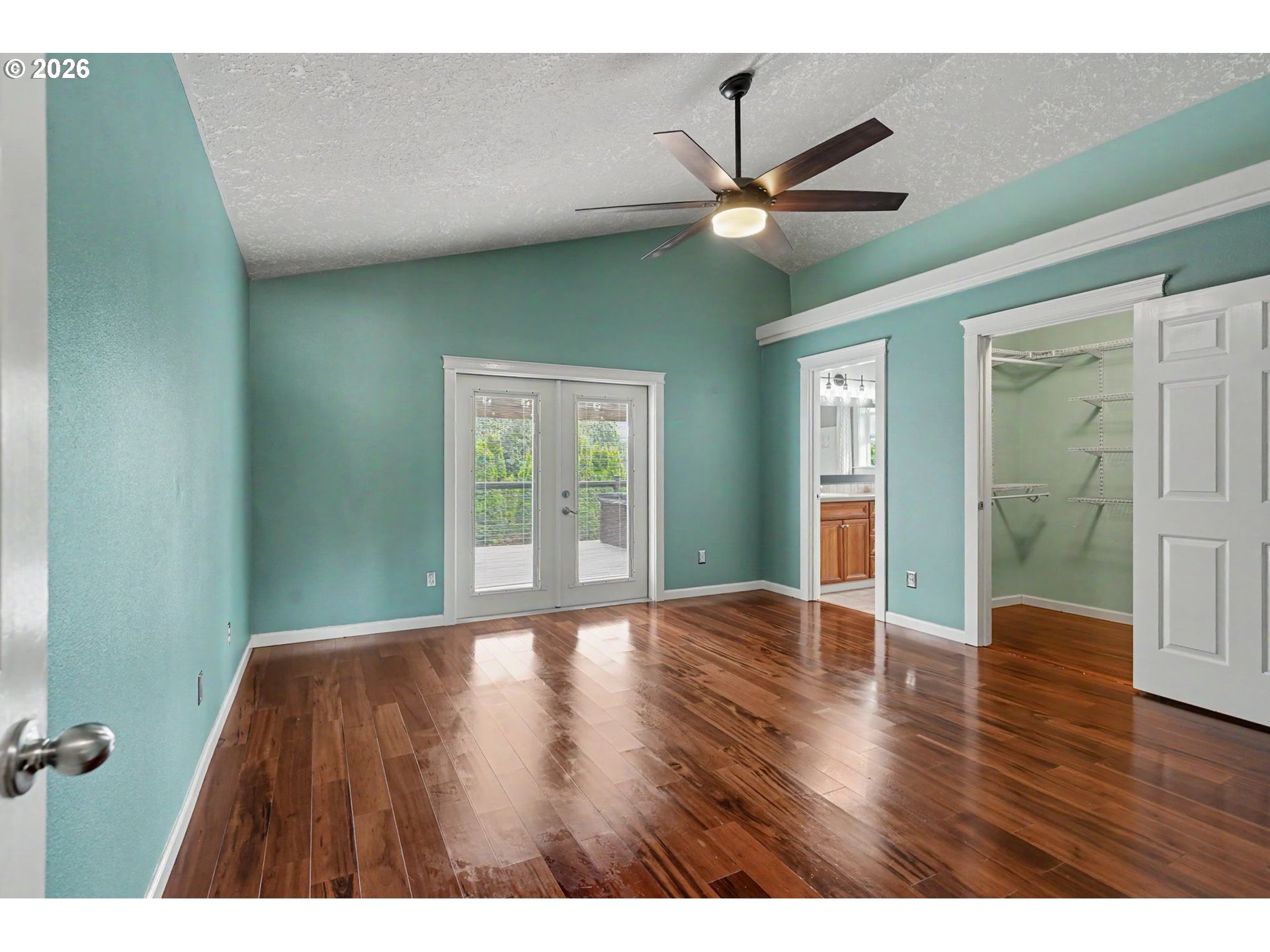 1462 Barnick Road Northeast Keizer, OR 97303 - Photo 24 of 48 a view of an empty room with wooden floor and a window