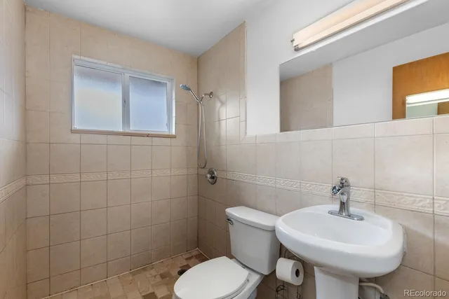 an empty room with closet area