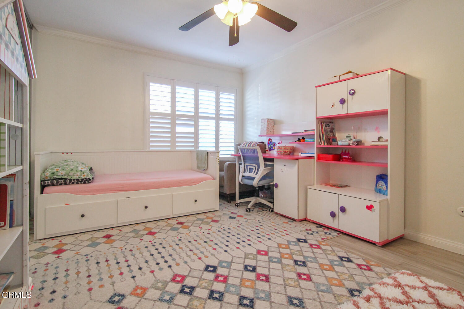 19230 Hamlin Street, Unit 1 Reseda, CA 91335 - Photo 11 of 17 a storage room with a bed and window