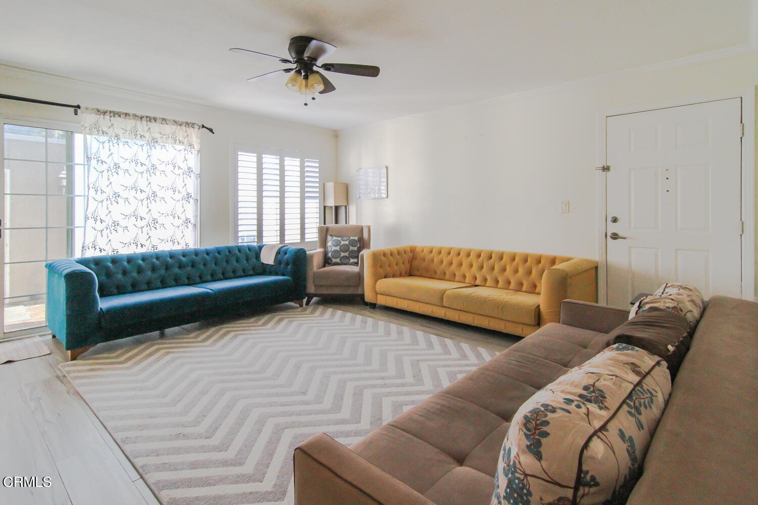 19230 Hamlin Street, Unit 1 Reseda, CA 91335 - Photo 3 of 17 a living room with furniture and a large window