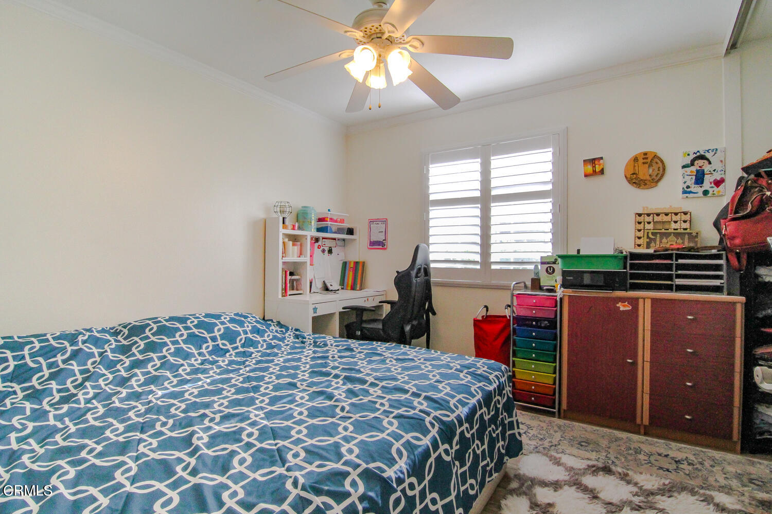 19230 Hamlin Street, Unit 1 Reseda, CA 91335 - Photo 10 of 17 a bedroom with a bed and a dresser