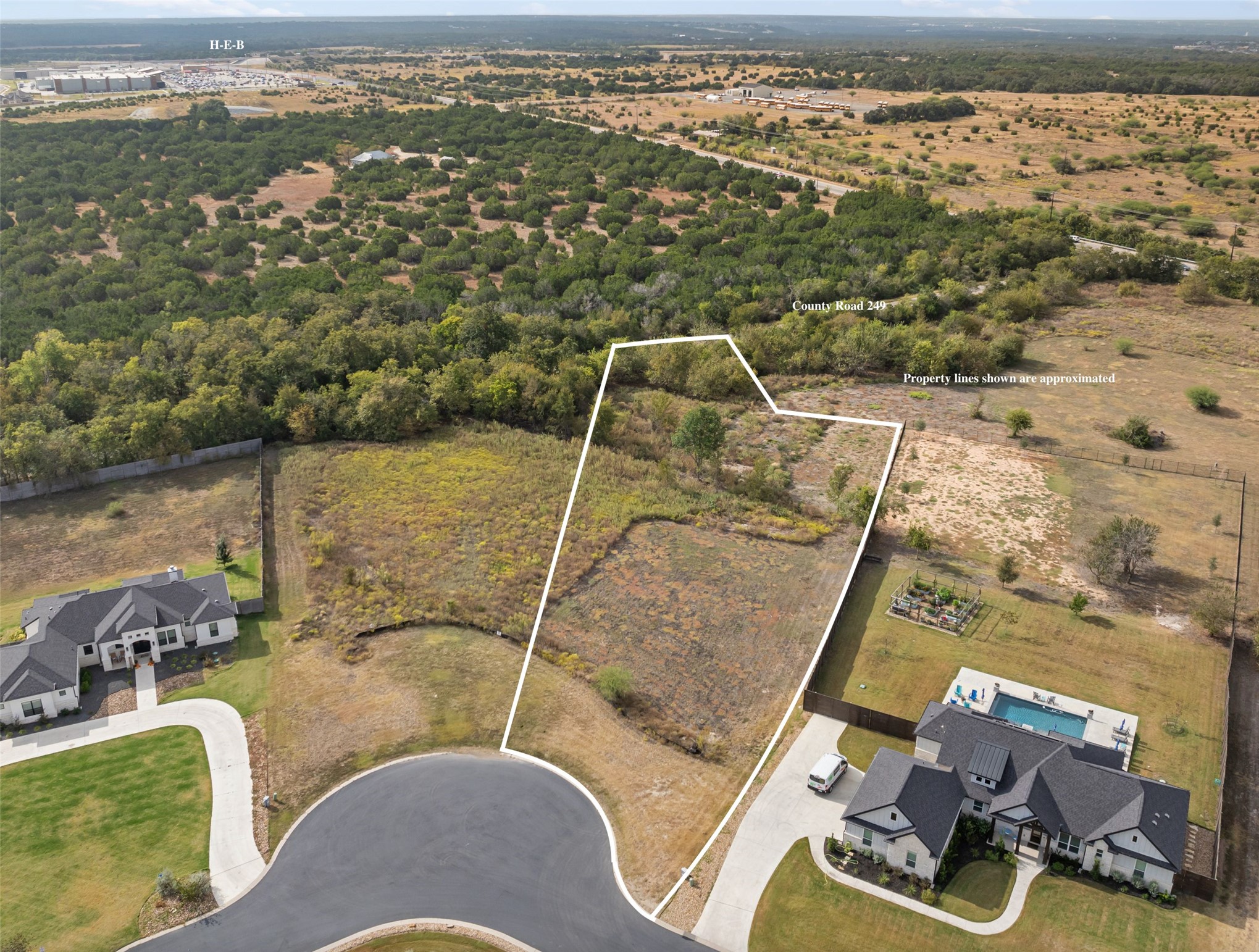 120 Huerta Road Florence, TX 76527 - Photo 1 of 10 Aerial view of property's location featuring property parcel outlined and rural landscape