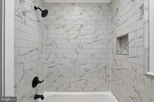 a bathroom with a bathtub