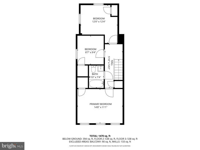 a picture of a bench in front of a wall