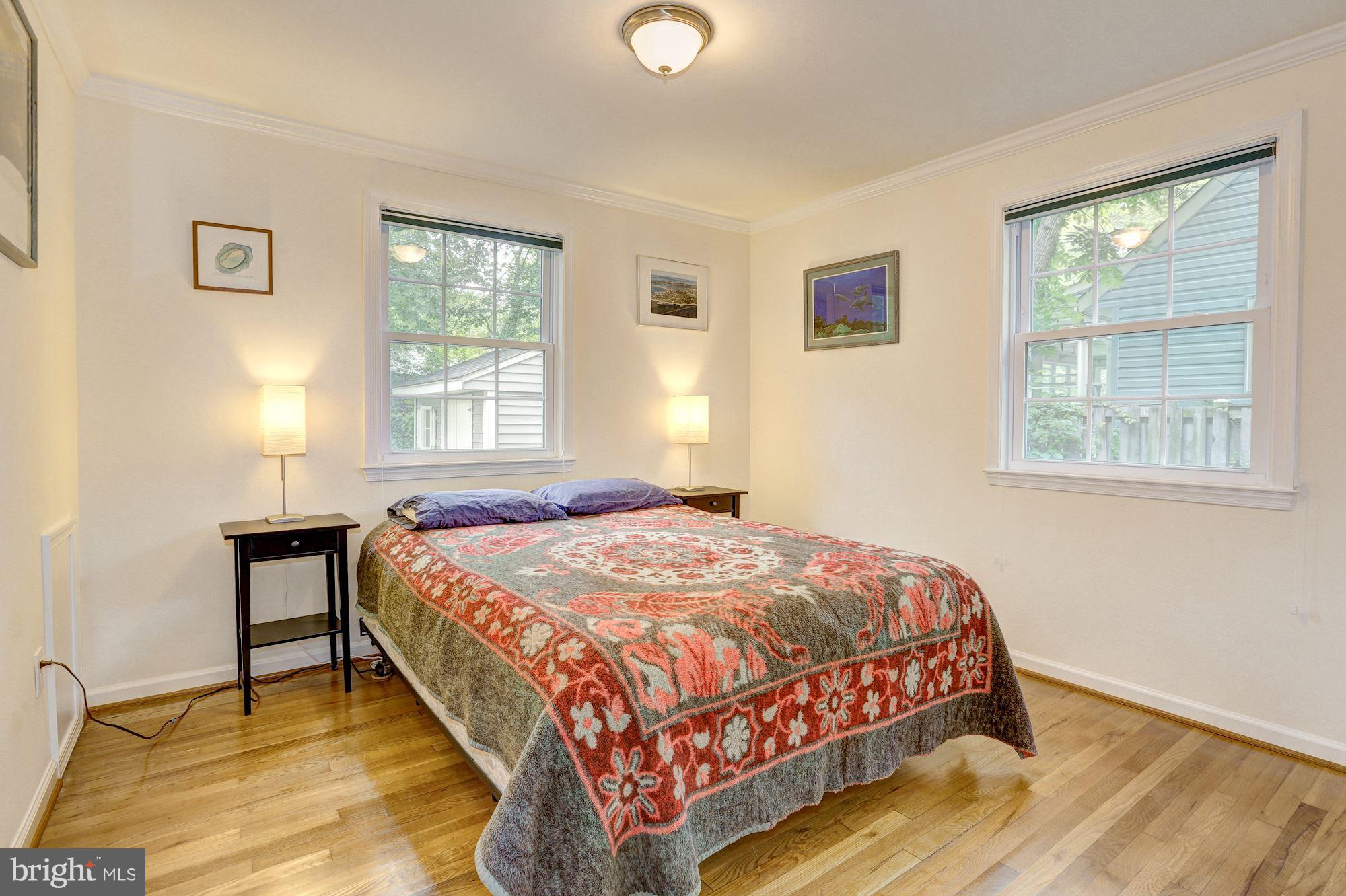 10409 Procter Street Silver Spring, MD 20901 - Photo 14 of 30 a bedroom with a bed and window