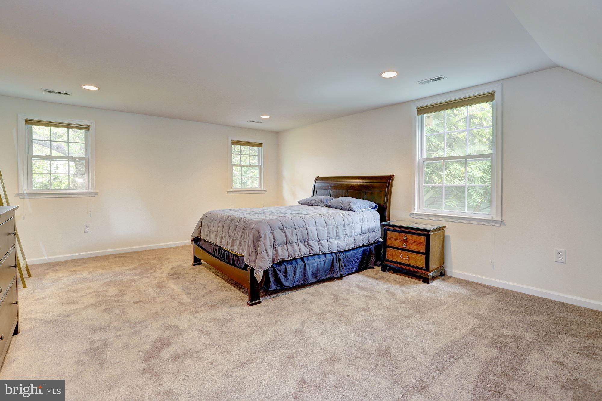 10409 Procter Street Silver Spring, MD 20901 - Photo 18 of 30 a bedroom with a bed and a window