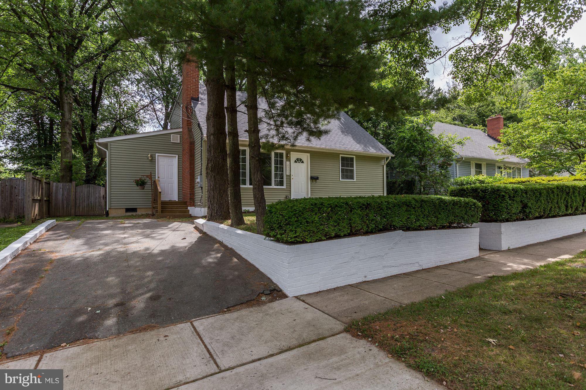 10409 Procter Street Silver Spring, MD 20901 - Photo 3 of 30 front view of a house with a yard