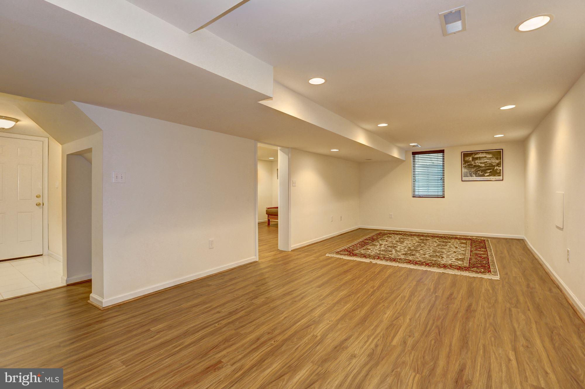 10409 Procter Street Silver Spring, MD 20901 - Photo 23 of 30 a view of an empty room and wooden floor