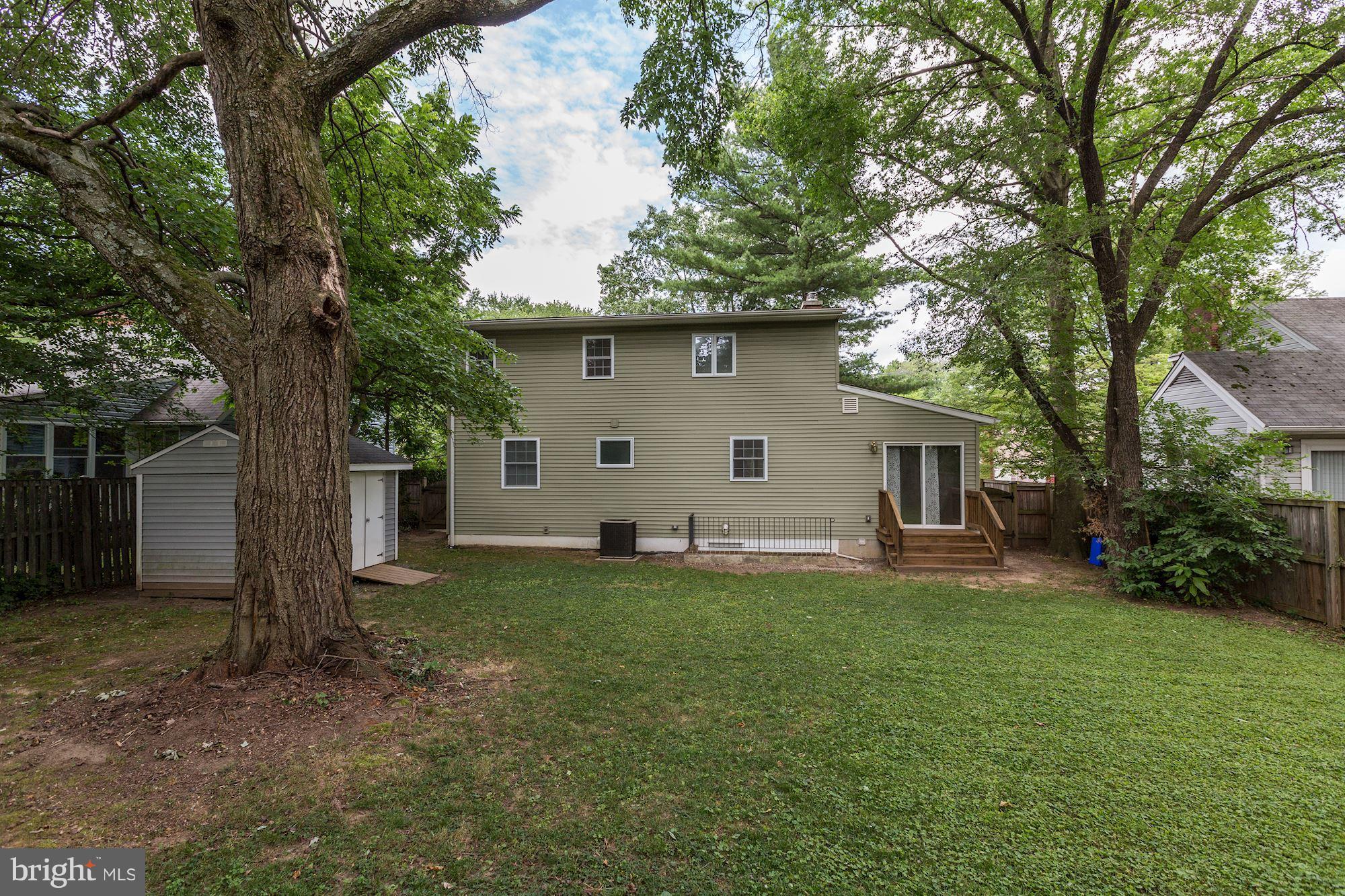 10409 Procter Street Silver Spring, MD 20901 - Photo 28 of 30 a house that has a tree in front of it