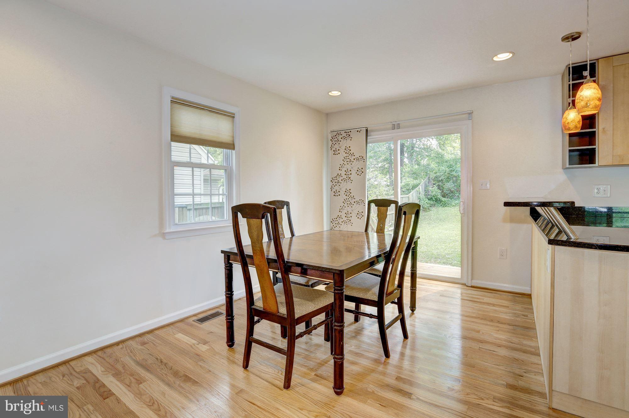10409 Procter Street Silver Spring, MD 20901 - Photo 7 of 30 a view of a dining room with furniture and a window