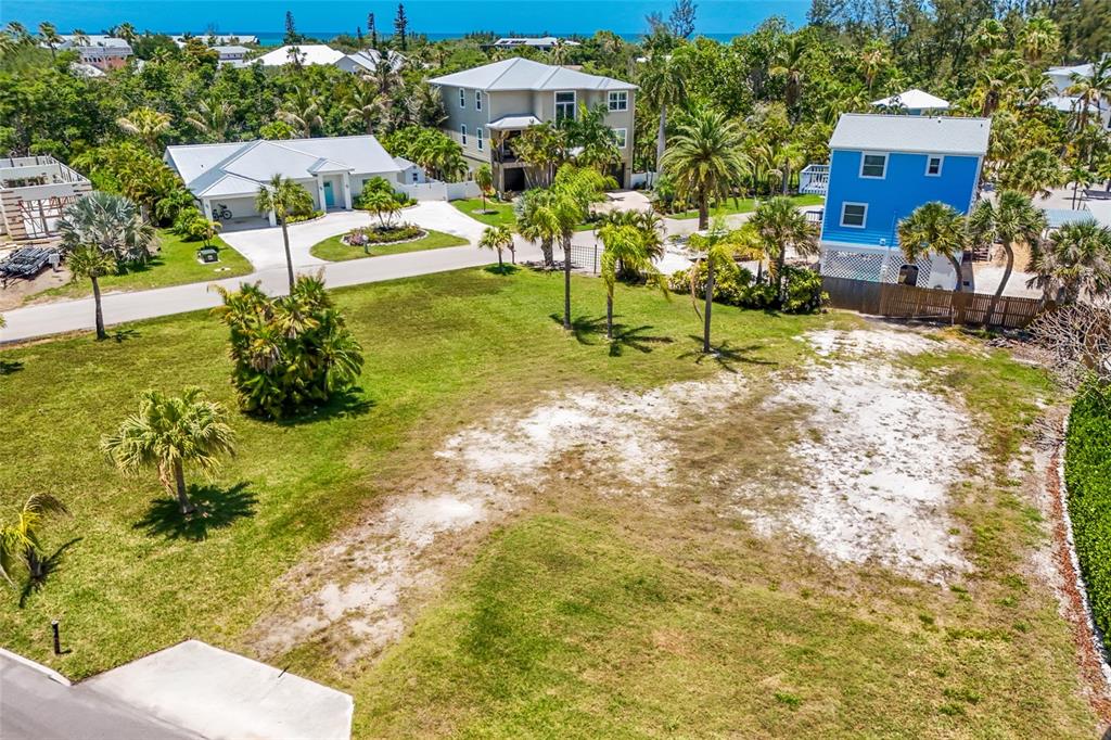 591 Russell Street Longboat Key, FL 34228 - Photo 9 of 19 a view of a house with a yard