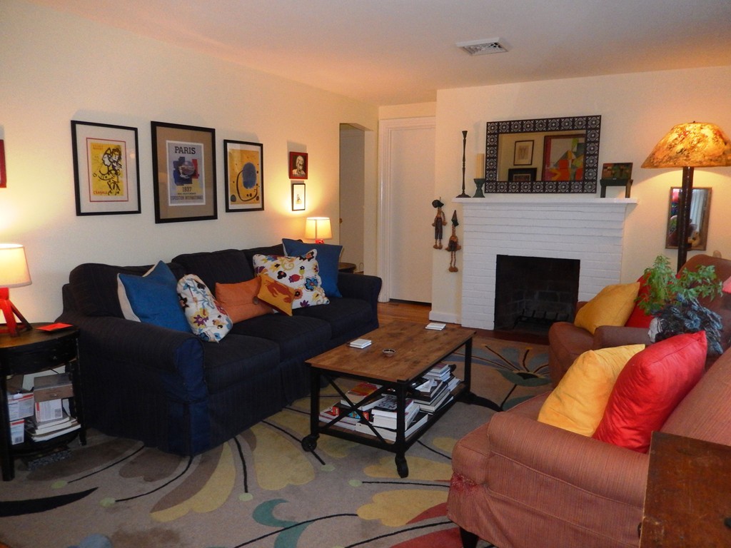 6 James Road Sharon, MA 02067 - Photo 3 of 10 a living room with furniture and a fireplace