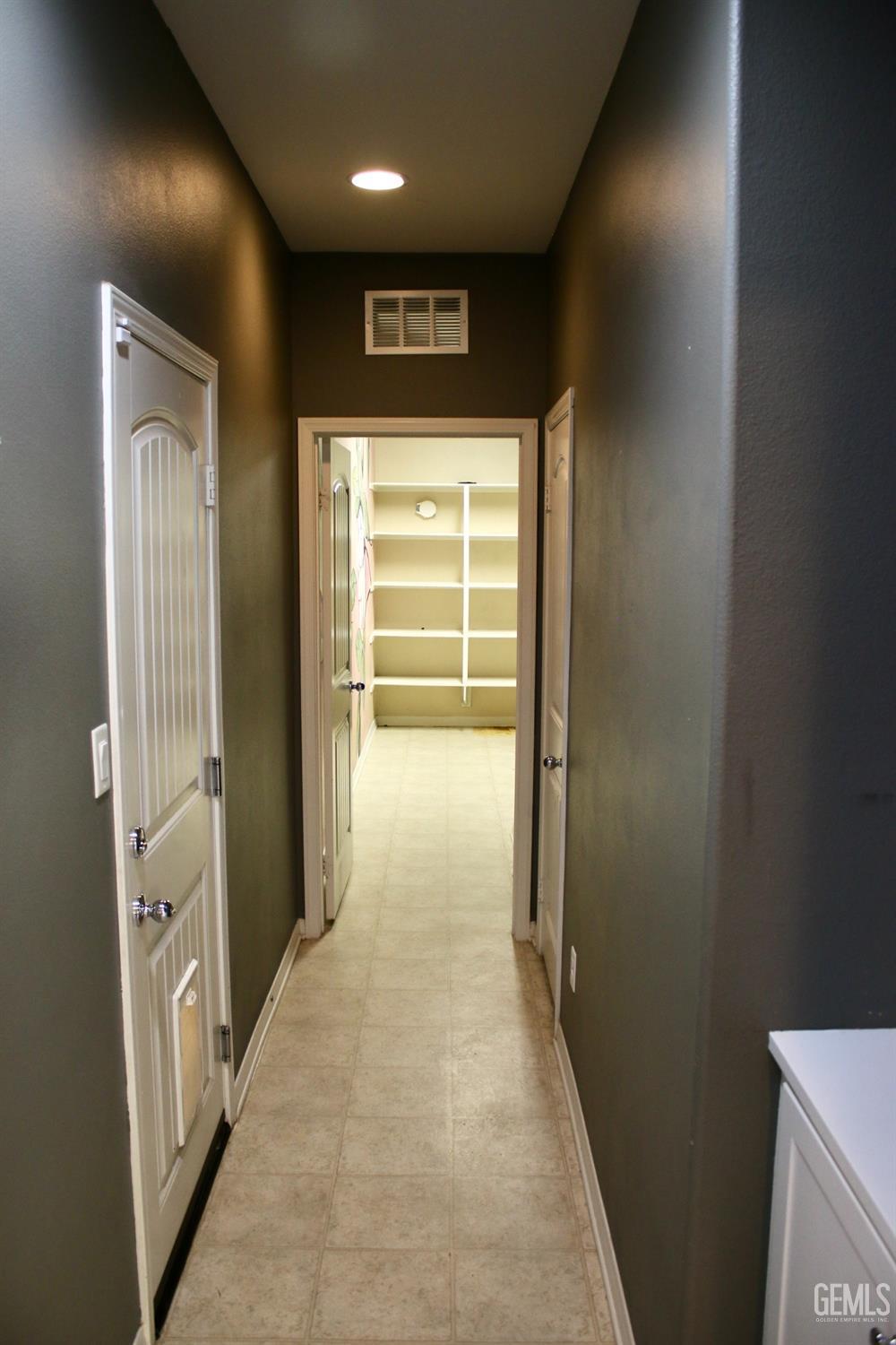 Undisclosed Address Bakersfield, CA 93313 - Photo 16 of 26 a view of hallway with stairs