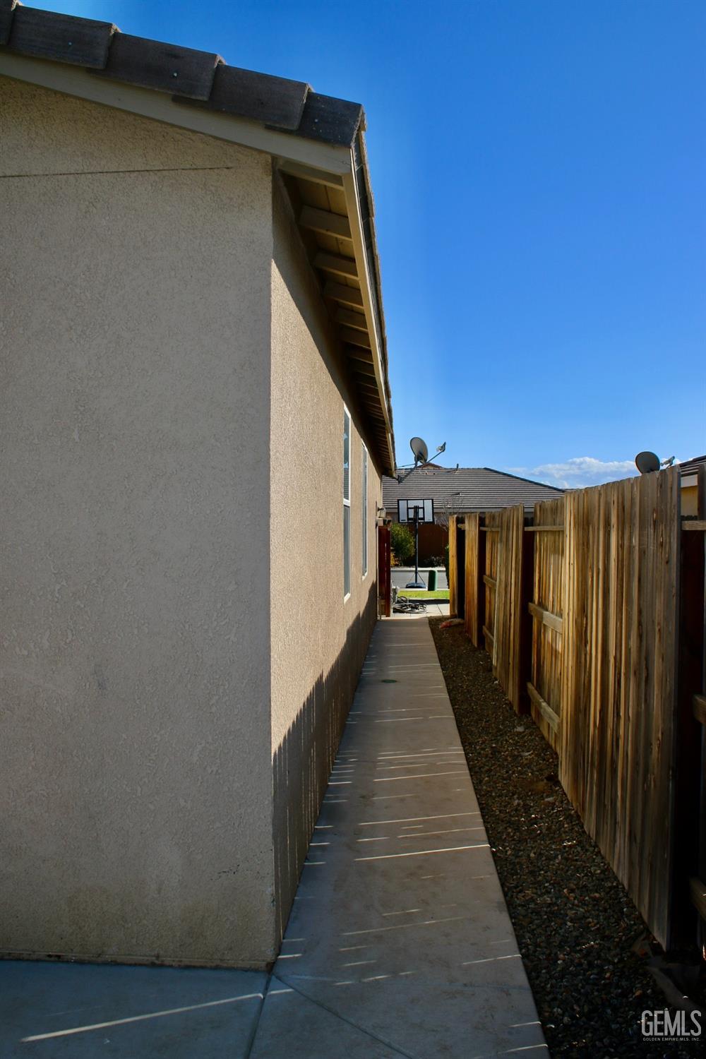 Undisclosed Address Bakersfield, CA 93313 - Photo 23 of 26 a view of a house with wooden floor