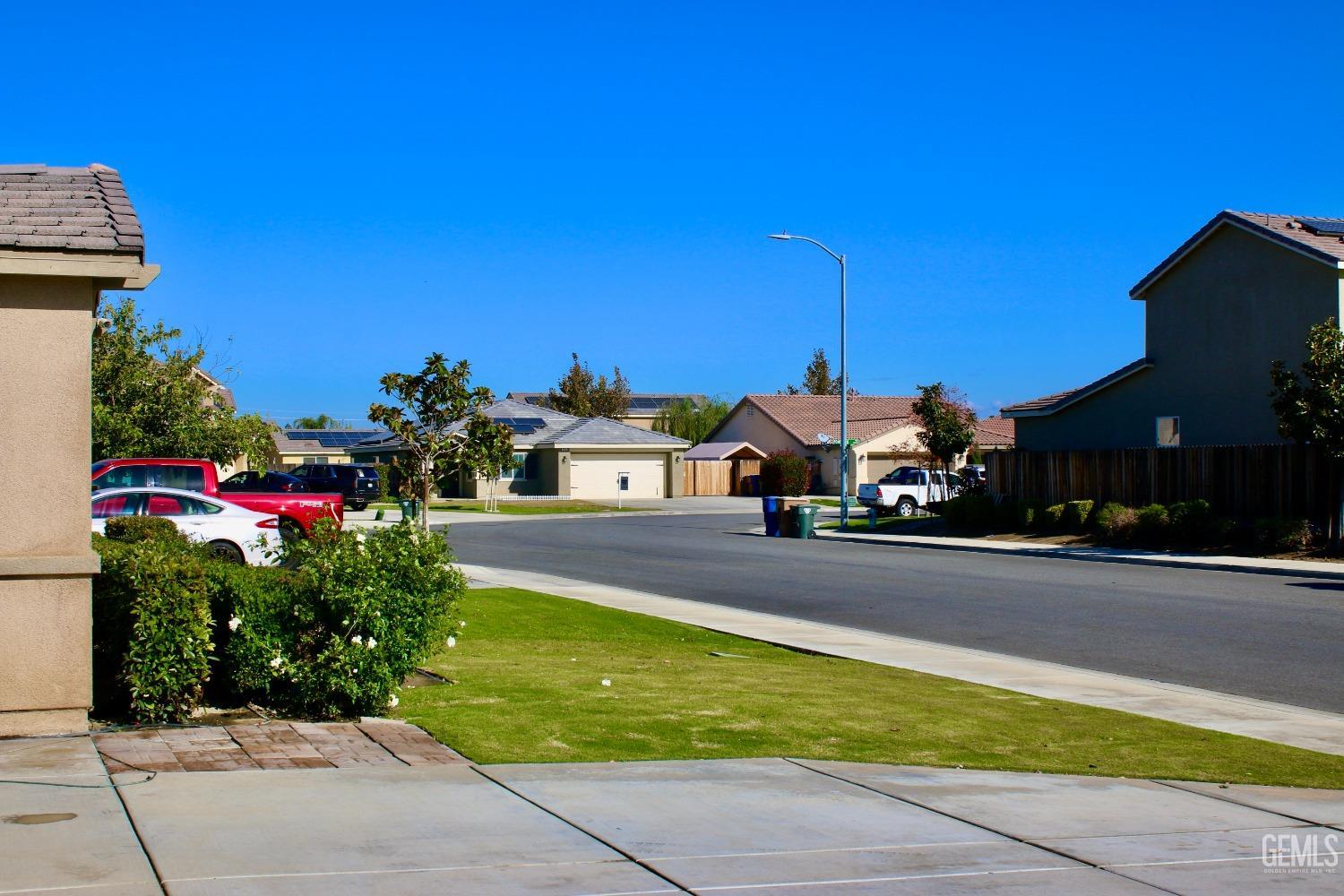 Undisclosed Address Bakersfield, CA 93313 - Photo 25 of 26 a view of a street with houses