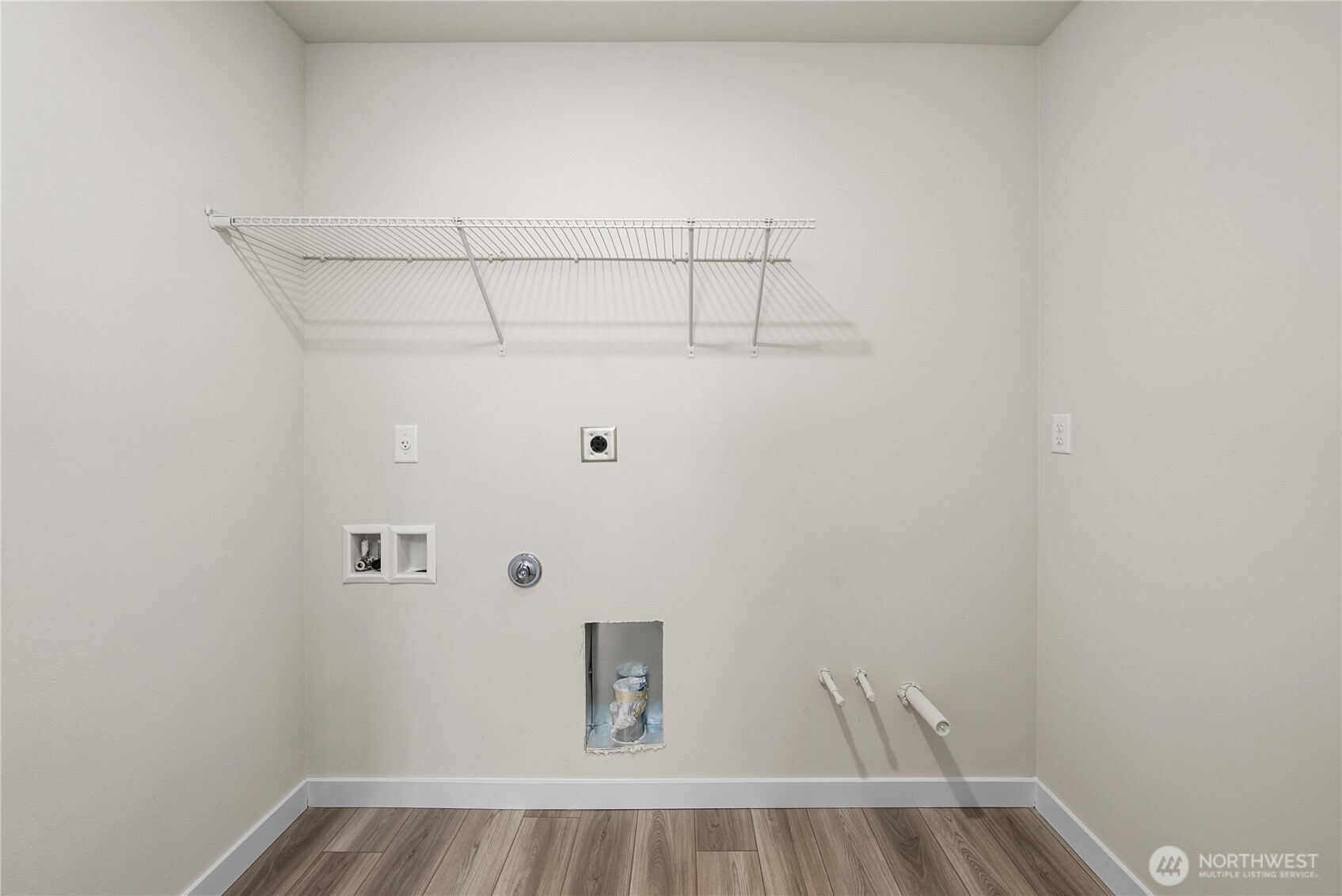 5924 Trce Drive Southwest Port Orchard, WA 98367 - Photo 17 of 25 a view of a room with racks on the wall