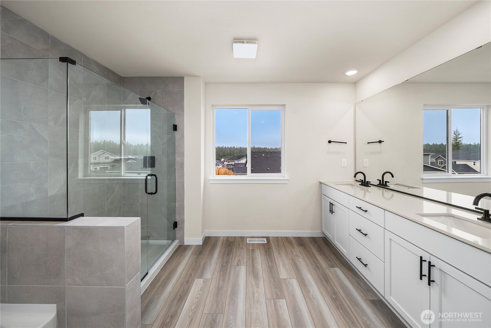 5924 Trce Drive Southwest Port Orchard, WA 98367 - Photo 20 of 25 a bathroom with a sink a window and mirror