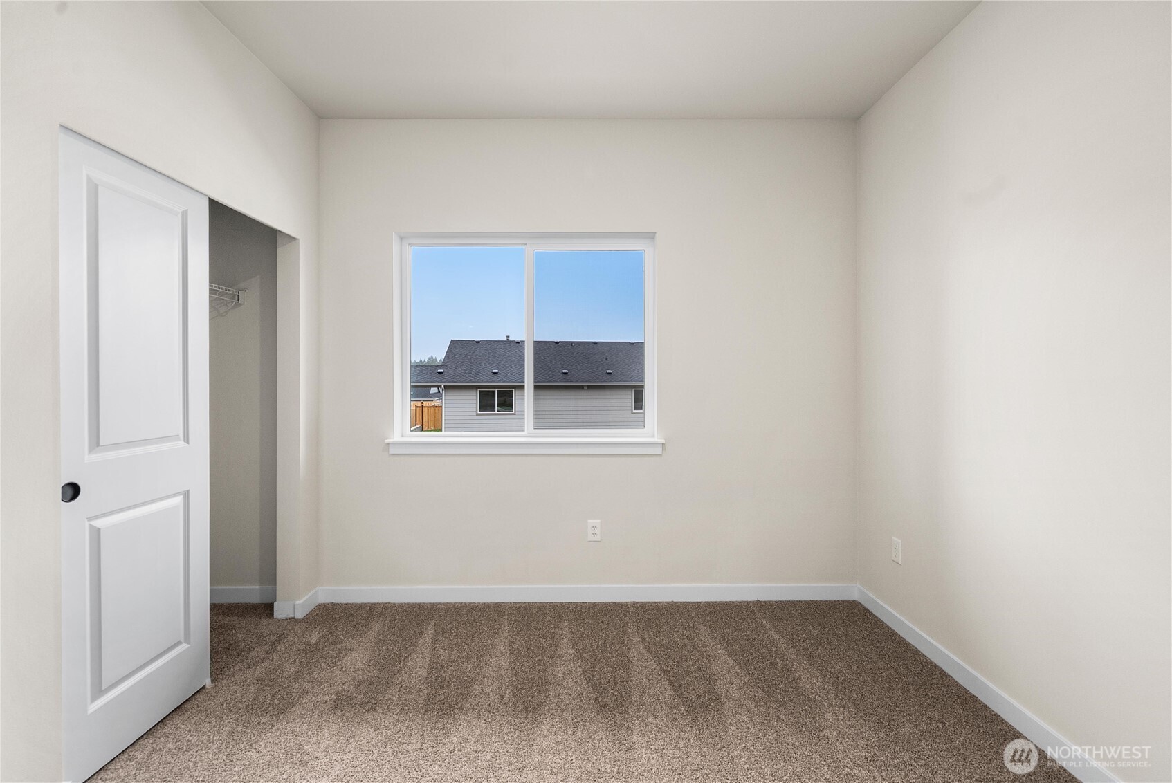 5924 Trce Drive Southwest Port Orchard, WA 98367 - Photo 3 of 25 a view of an empty room with closet and a window