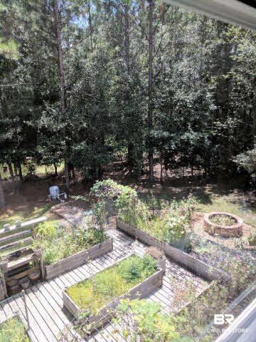 13848 Elmwood Court Stapleton, AL 36578 - Photo 21 of 27 Grow your own herbs, flowers and vegetables in this organic garden.