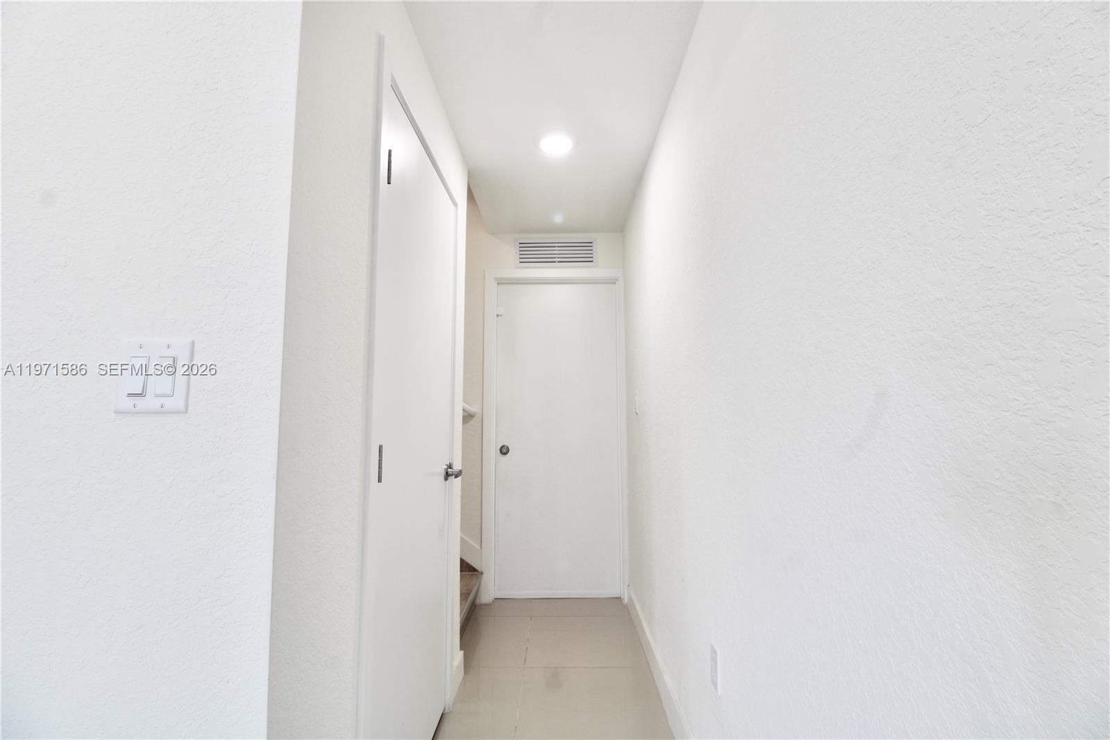 25875 Southwest 145th Avenue Homestead, FL 33032 - Photo 20 of 30 a view of a hallway
