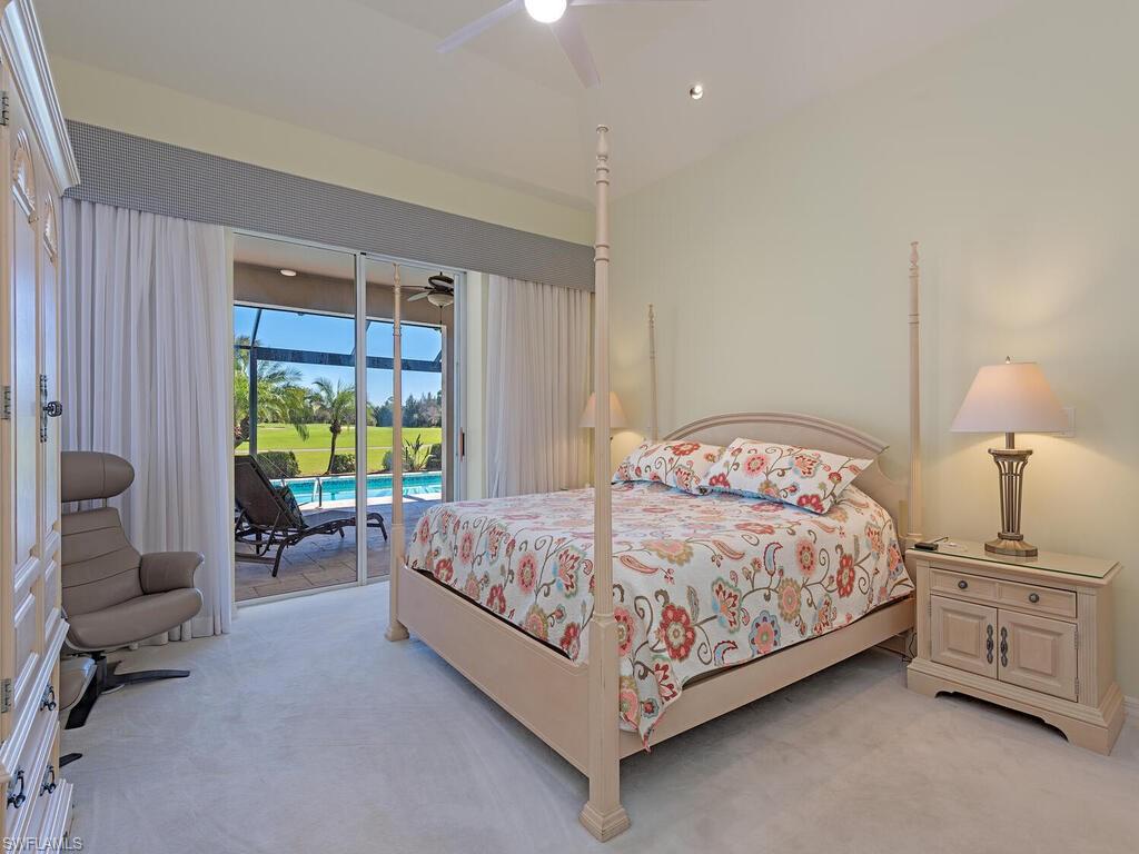 1832 Imperial Golf Course Boulevard Naples, FL 34110 - Photo 8 of 24 Bedroom featuring access to outside, light colored carpet, ceiling fan, and a sunroom
