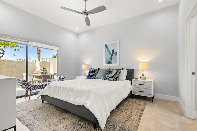 a view of swimming pool with outdoor seating