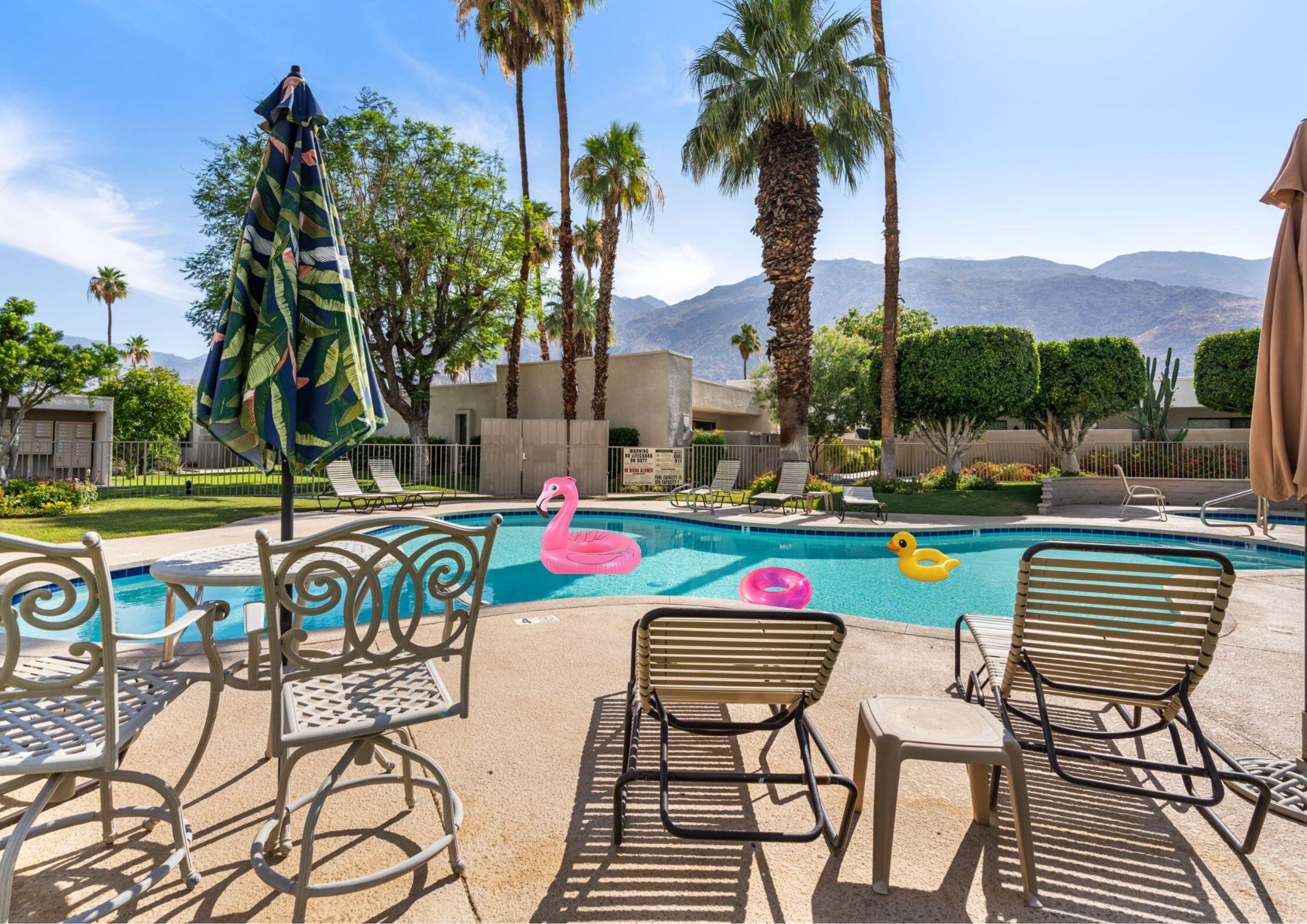 877 East Arenas Road Palm Springs, CA 92262 - Photo 19 of 43 a view of swimming pool with outdoor seating