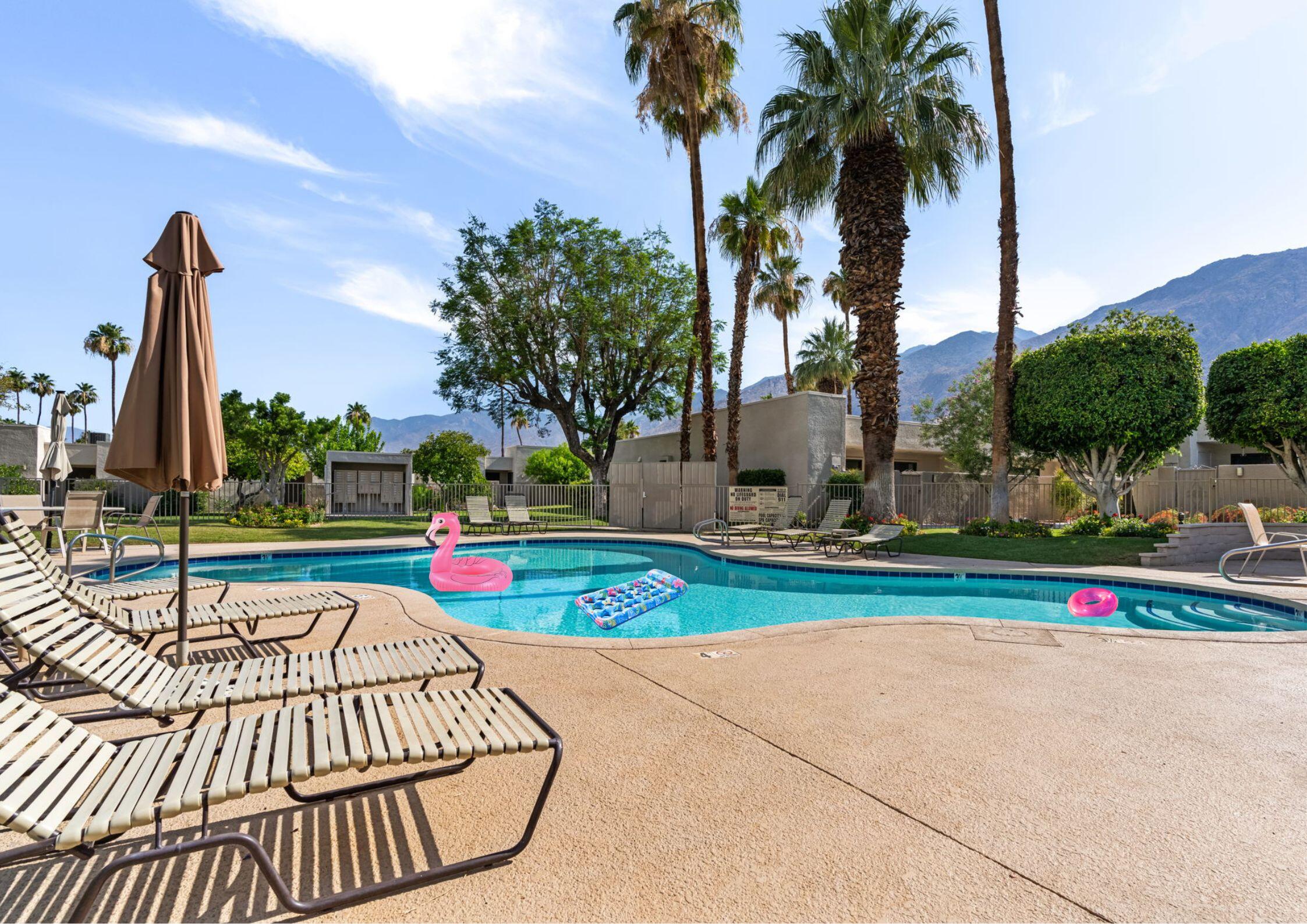 877 East Arenas Road Palm Springs, CA 92262 - Photo 2 of 43 a park with palm trees
