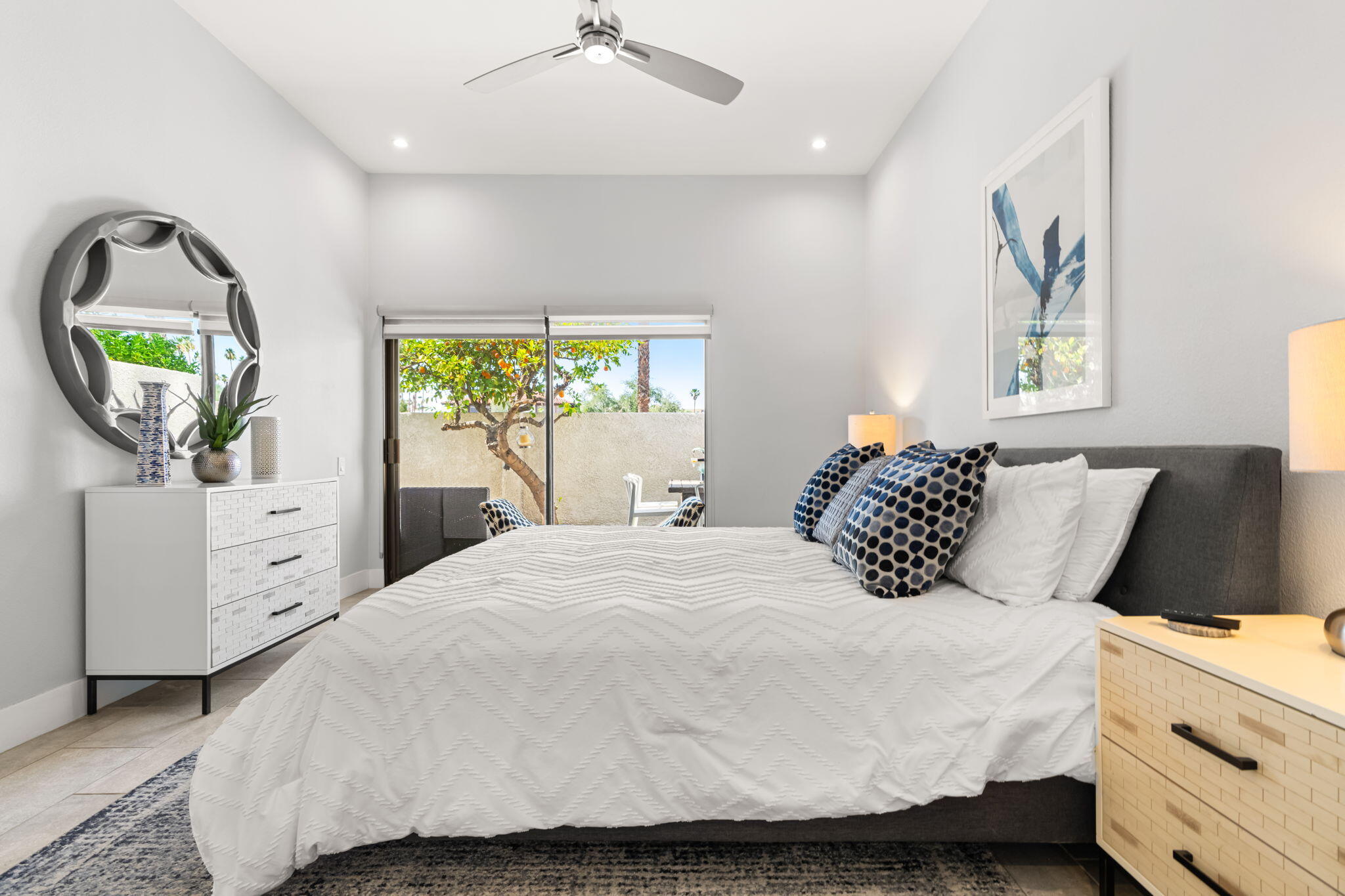 877 East Arenas Road Palm Springs, CA 92262 - Photo 24 of 43 a bedroom with a large bed and a window