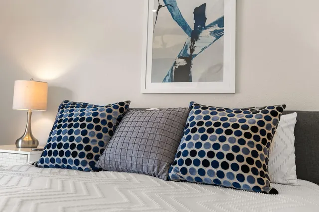 a bathroom with sink and mirror