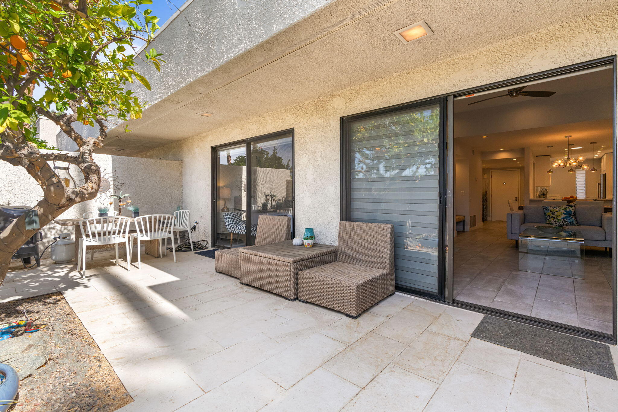 877 East Arenas Road Palm Springs, CA 92262 - Photo 37 of 43 a living room with furniture and a large window