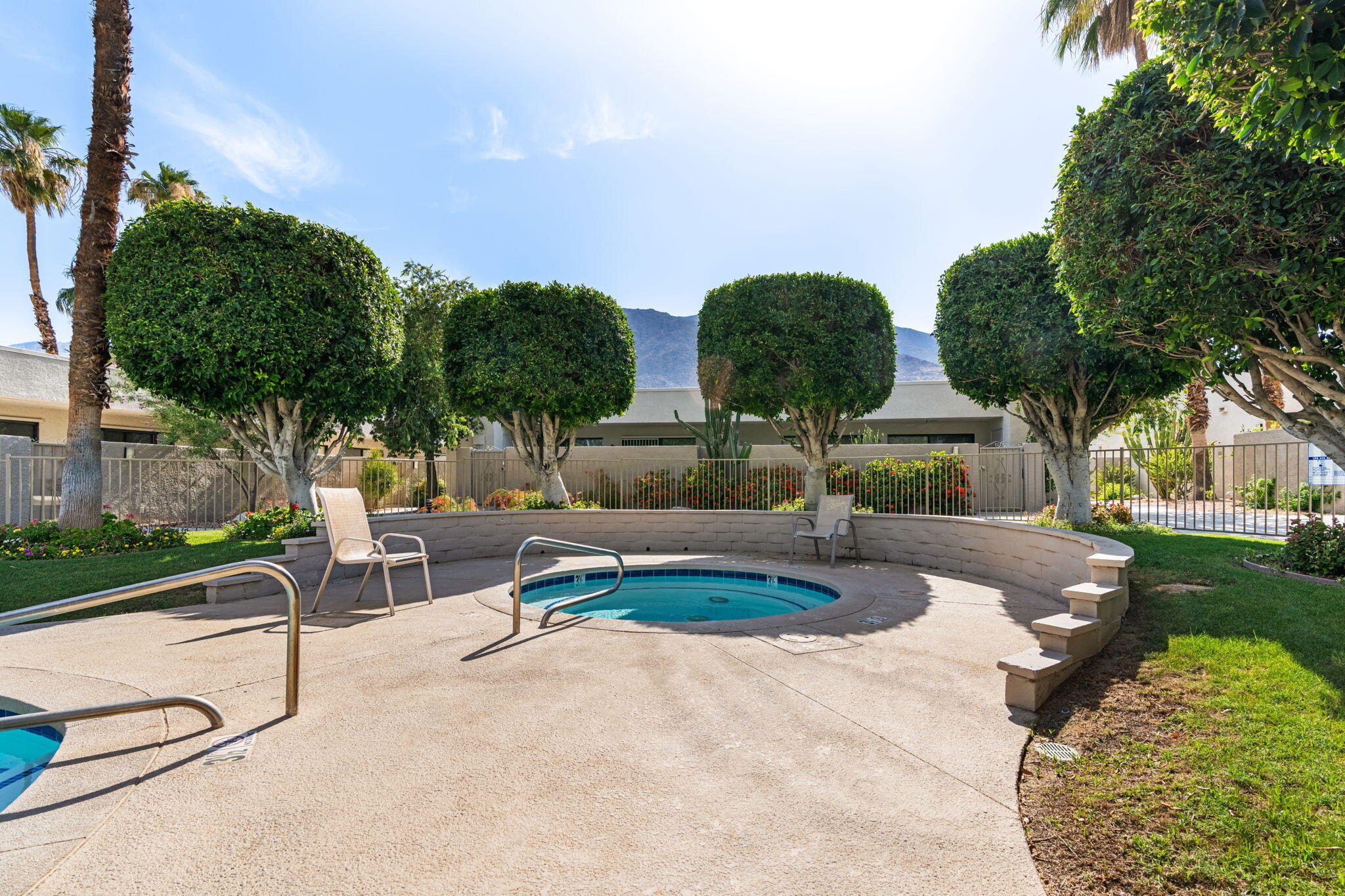 877 East Arenas Road Palm Springs, CA 92262 - Photo 41 of 43 a view of swimming pool with outdoor seating and plants