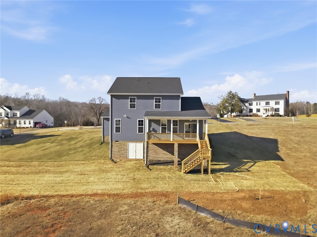 1711 Reed Marsh Lane Goochland, VA 23063 - Photo 24 of 25 a view of a swimming pool with a chair and tables in the ocean