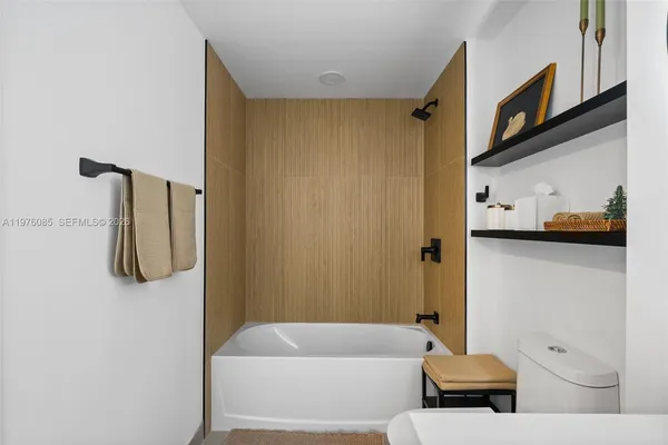 a bathroom with a sink and a shower