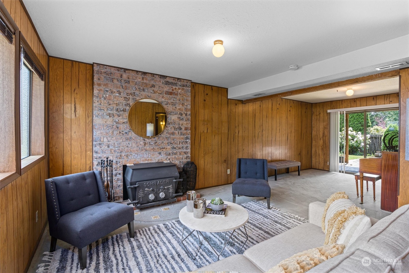 9623 Northeast 204th Place Bothell, WA 98011 - Photo 16 of 26 a living room with fireplace furniture and a fireplace