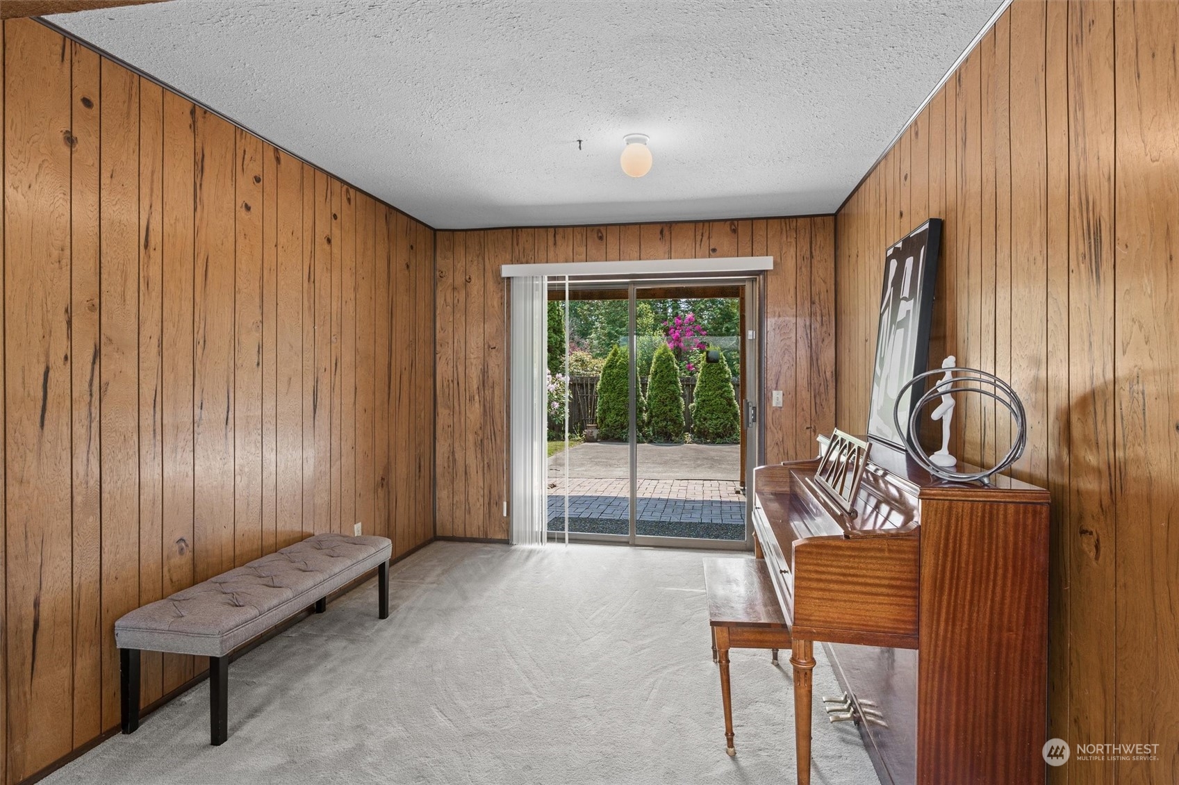 9623 Northeast 204th Place Bothell, WA 98011 - Photo 18 of 26 a view of an entryway with wooden floor and door