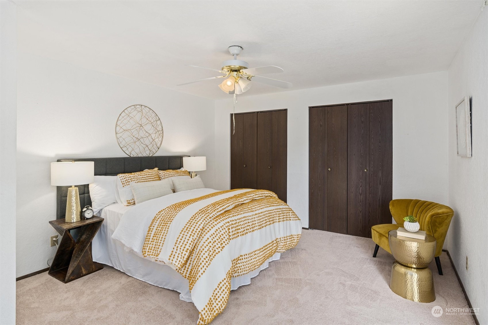 9623 Northeast 204th Place Bothell, WA 98011 - Photo 10 of 26 a bedroom with a bed and a chandelier