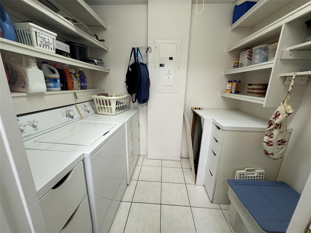 329 Genesis Pointe Drive, Unit 329 Lake Wales, FL 33859 - Photo 26 of 29 a utility room with dryer and washer