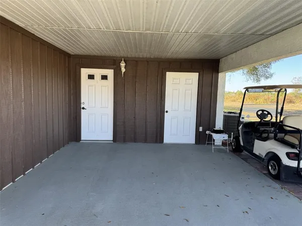 a view of a livingroom with car parked