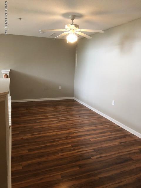 8550 Touchton Road, Unit 938 Jacksonville, FL 32216 - Photo 15 of 32 a view of an empty room with a fan