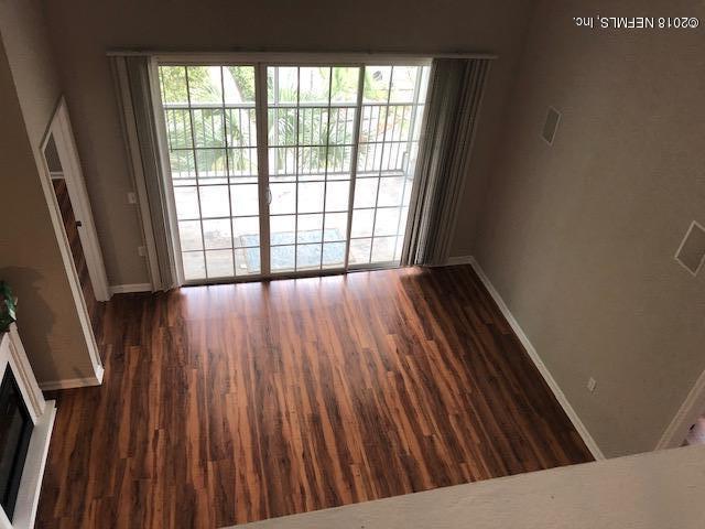 8550 Touchton Road, Unit 938 Jacksonville, FL 32216 - Photo 17 of 32 a view of balcony with wooden floor