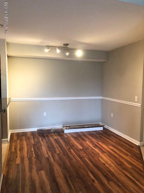 8550 Touchton Road, Unit 938 Jacksonville, FL 32216 - Photo 4 of 32 a view of an empty room